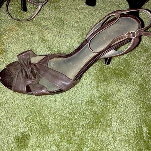 Brown, opened toed, Nine West heeled sandals.
